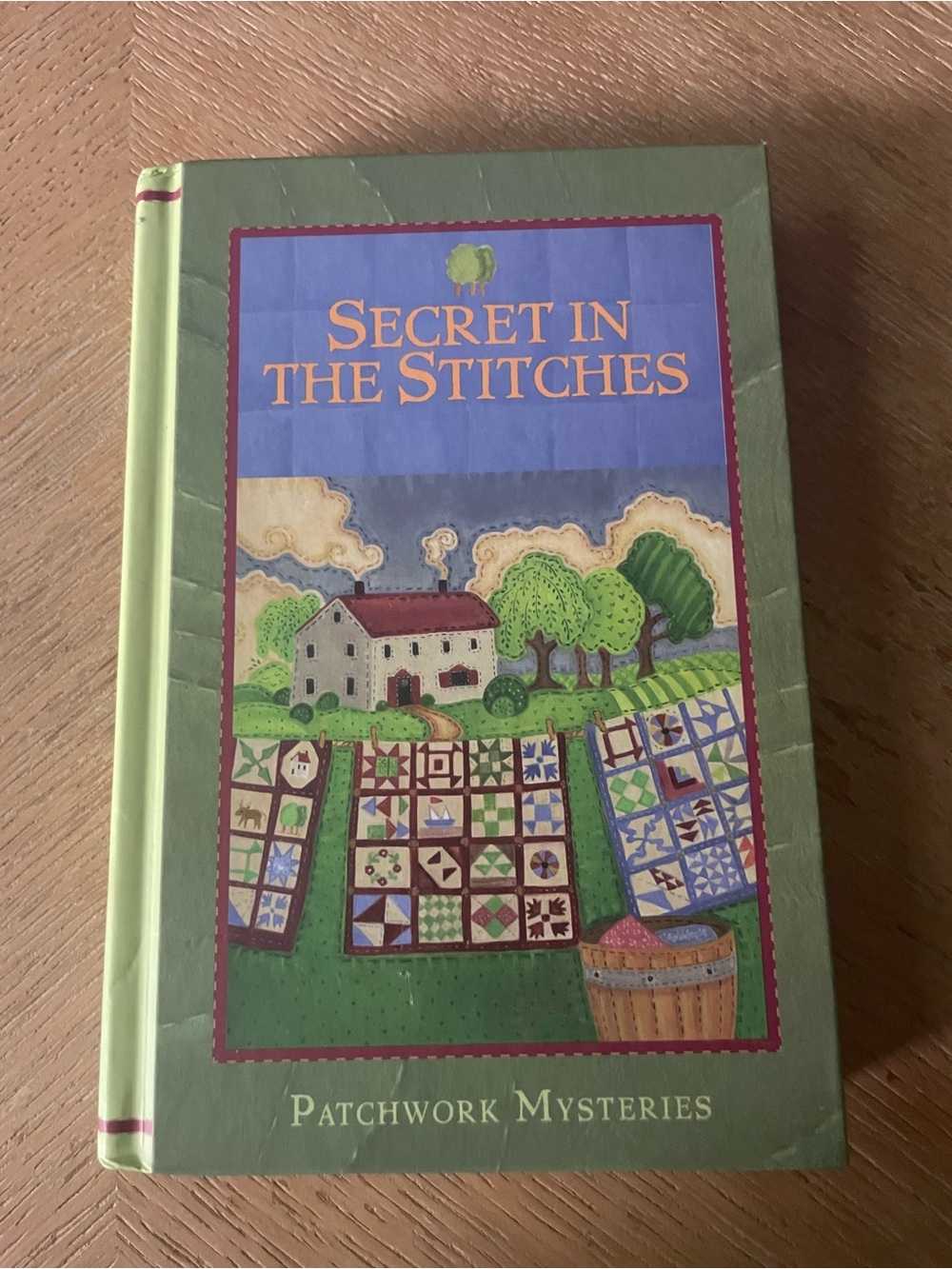 Secret in the Stitches #8, Patchwork Mysteries - HardCover